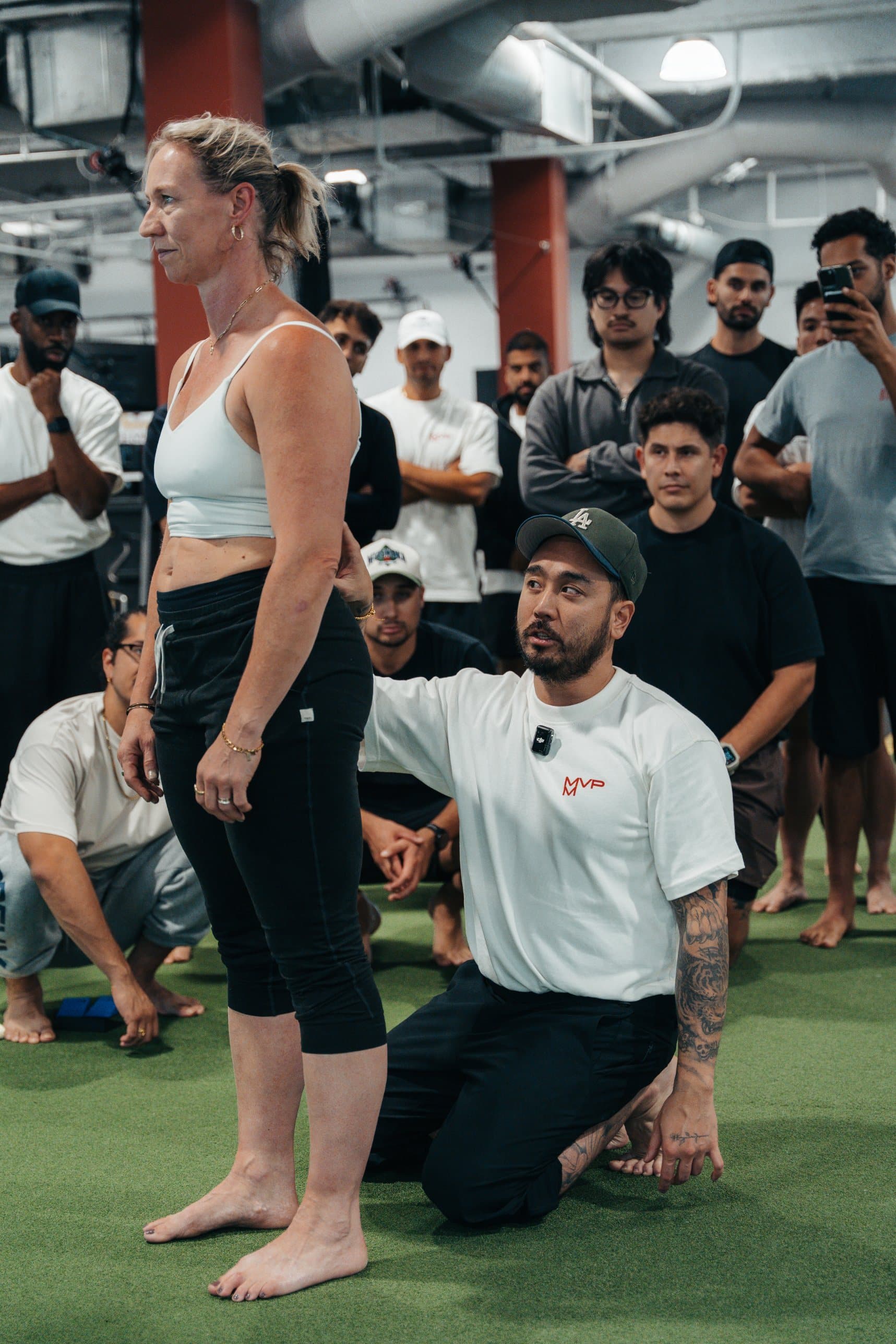 An MMVP instructor teaching a movement assessment to a group of practitioners