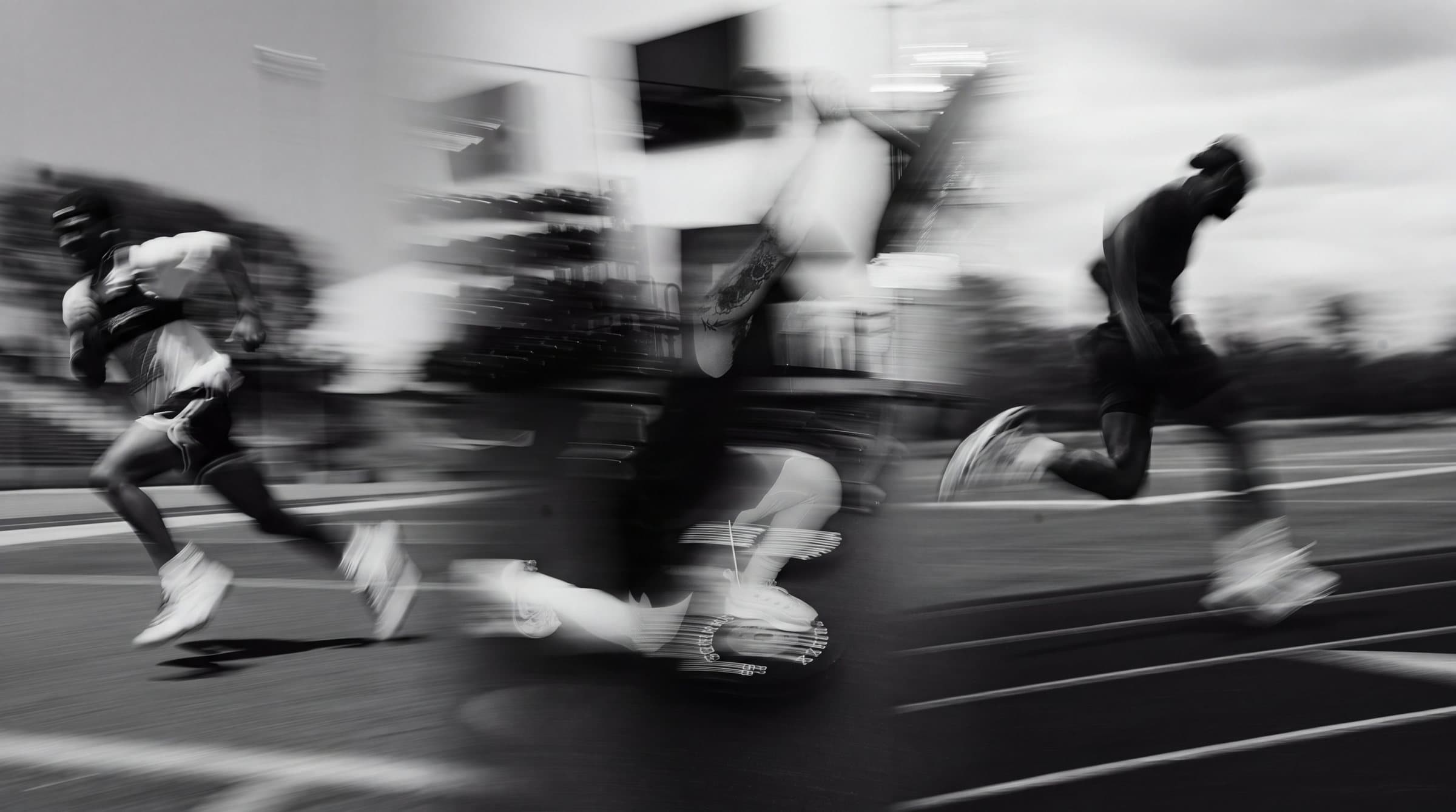 Athletes sprinting on a track